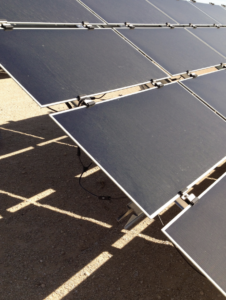 Dust visible on solar modules at a bladed and graded site Gila Bend Yuma County Arizona.